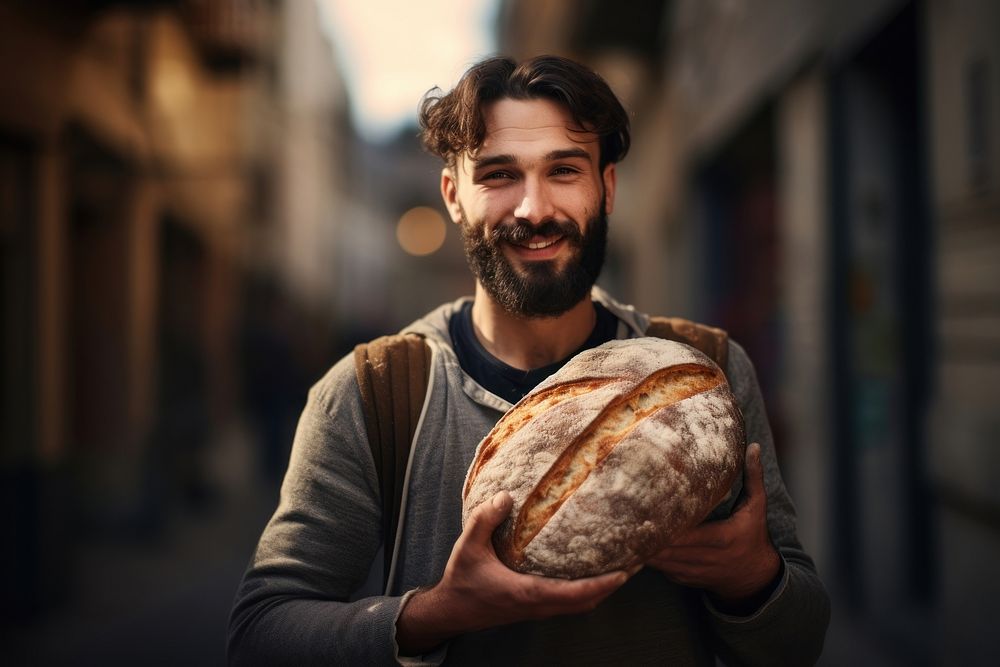Man holding a loaf of bread adult food architecture. AI generated Image by rawpixel.