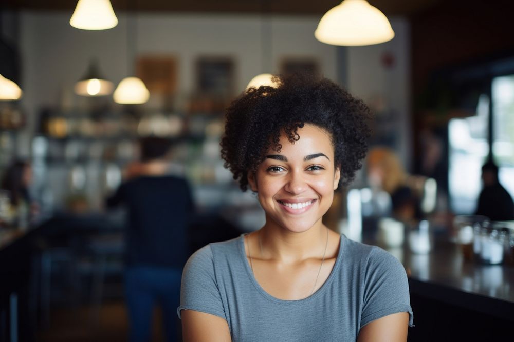 Woman smiling at the counter adult smile cafe. AI generated Image by rawpixel.