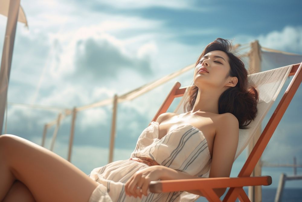 Singaporean women sunbathing sitting summer. AI generated Image by rawpixel.