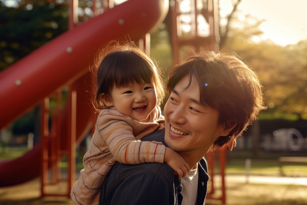 Smiling japanese father carrying his son playground park outdoors. AI generated Image by rawpixel.