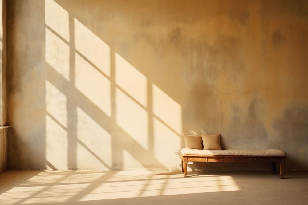 Clear wall bathed in warm sunlight with subtle shadows architecture furniture building. AI generated Image by rawpixel.