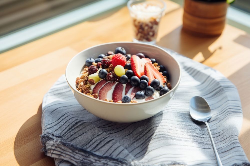 Acai bowl table spoon food. AI generated Image by rawpixel.
