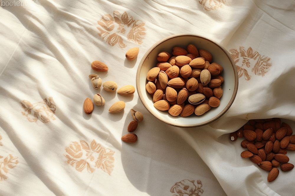 Nuts almond table food. AI generated Image by rawpixel.