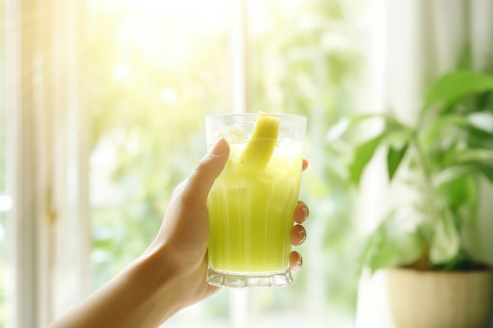 Detox juice drink hand lemonade. AI generated Image by rawpixel.