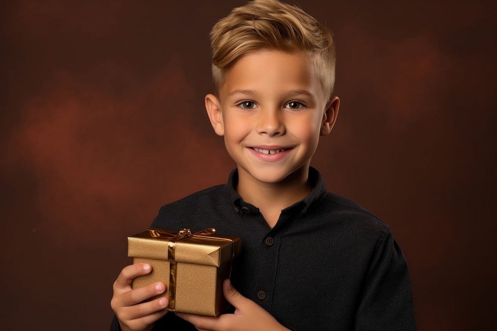 Child holding gift box portrait smiling smile. AI generated Image by rawpixel.