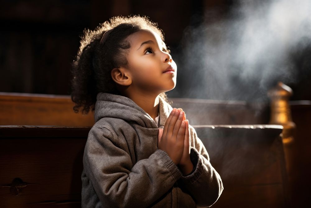 Child praying contemplation spirituality architecture. AI generated Image by rawpixel.