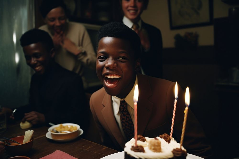 Black boy eating cupcale party birthday dessert. AI generated Image by rawpixel.