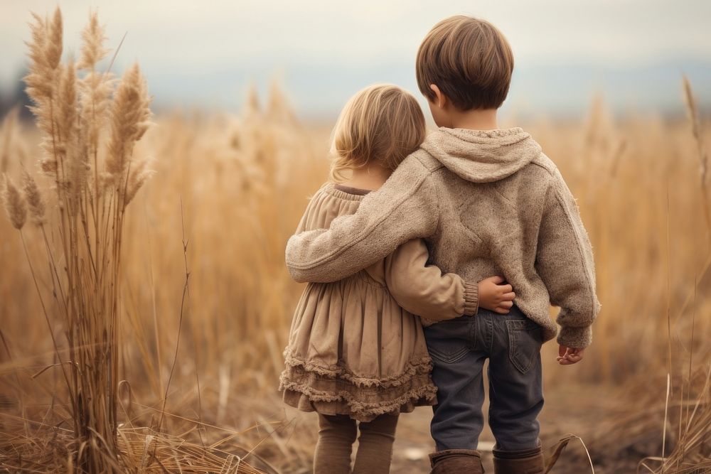 Children standing sweater hugging togetherness. AI generated Image by rawpixel.