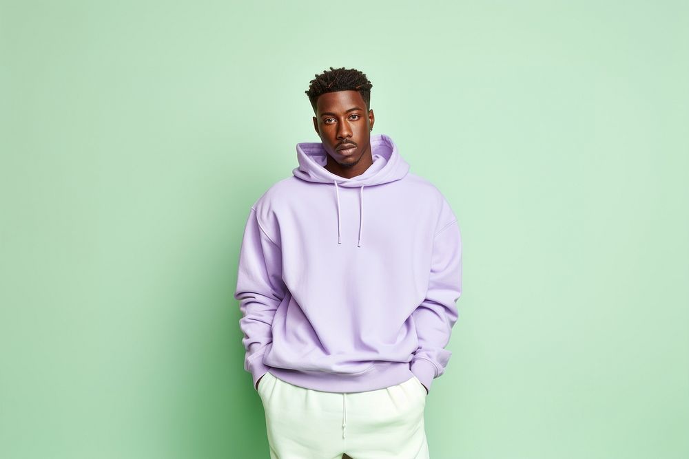 American African man torso wearing pastel green baggy sweatshirt purple outerwear portrait. AI generated Image by rawpixel.