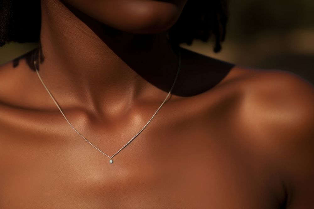 Black woman collarbone wearing chic necklace jewelry skin. AI generated Image by rawpixel.