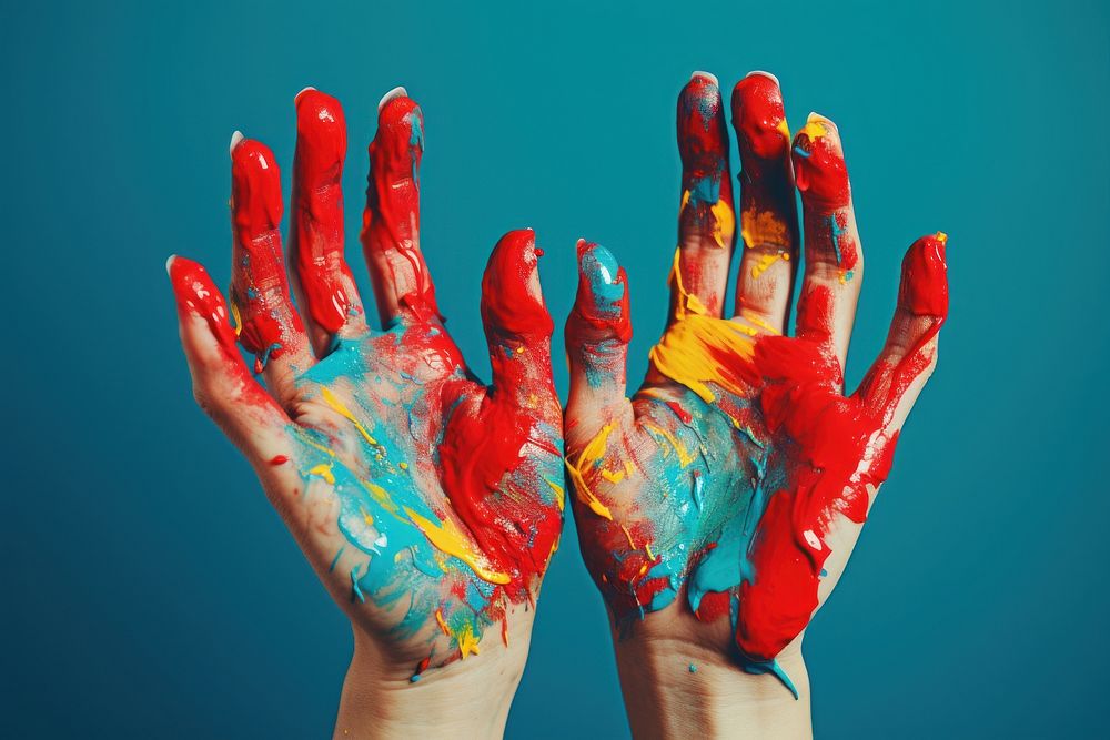 Hands with paint raising finger creativity painting. AI generated Image by rawpixel.