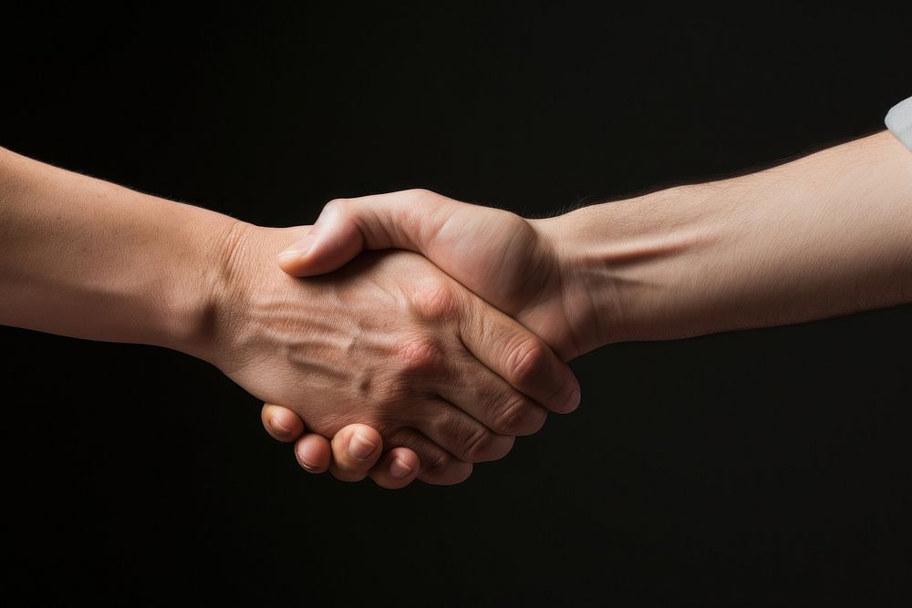 Hands shaking handshake monochrome agreement. AI generated Image by rawpixel.