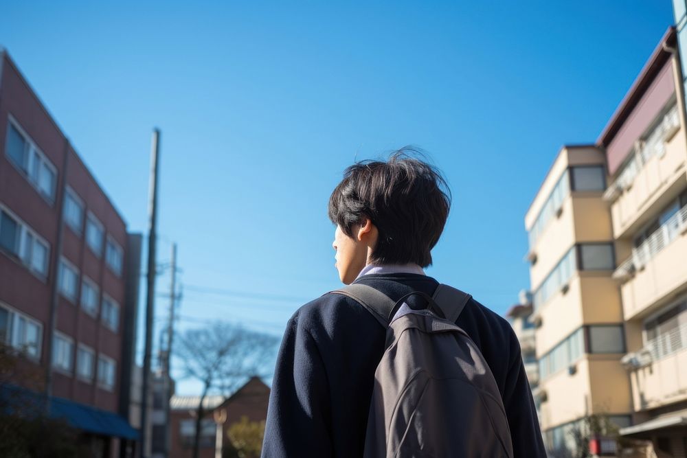 Young japanese student backpack walking adult. AI generated Image by rawpixel.