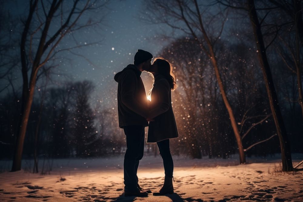 Couple outdoors kissing winter. AI generated Image by rawpixel.
