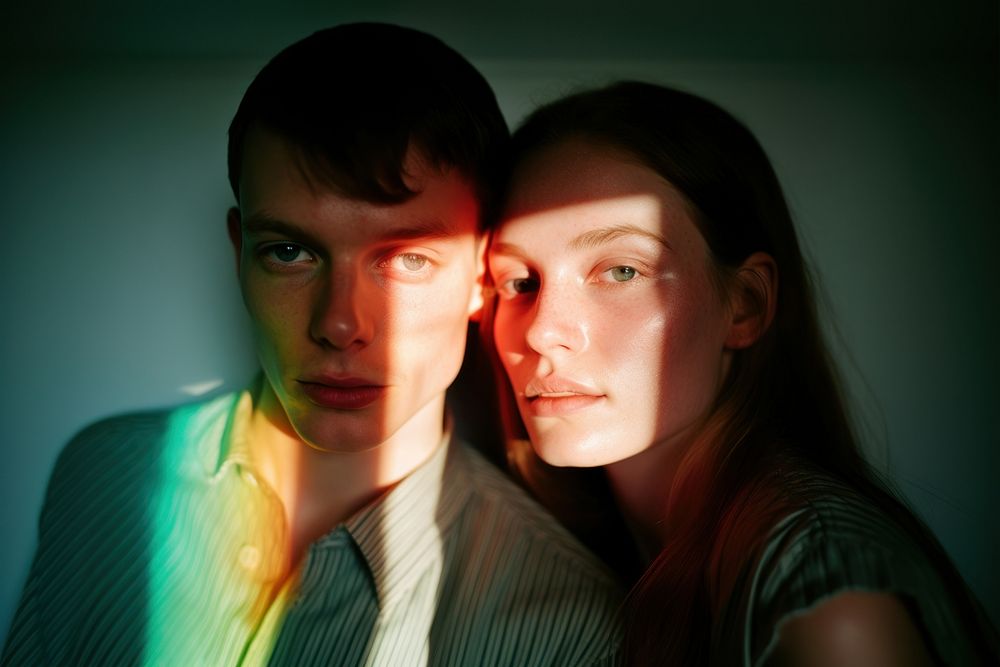 Rainbow light on couple face photography portrait adult. AI generated Image by rawpixel.
