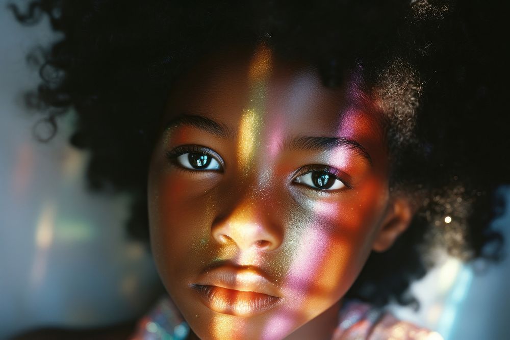 Rainbow light on black baby face photography portrait skin. AI generated Image by rawpixel.
