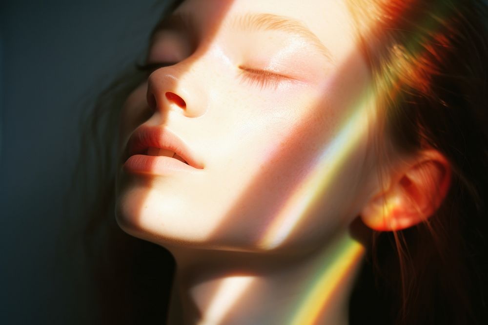 Rainbow light on face photography portrait adult. 