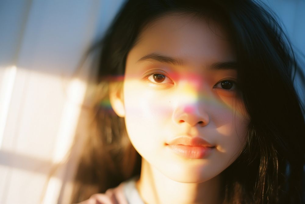 Rainbow light on friendship face photography portrait contemplation. AI generated Image by rawpixel.