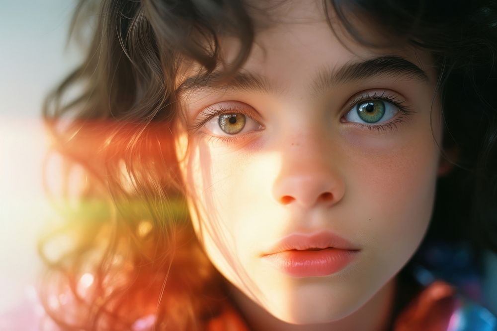 Rainbow light on kids face photography portrait child. AI generated Image by rawpixel.