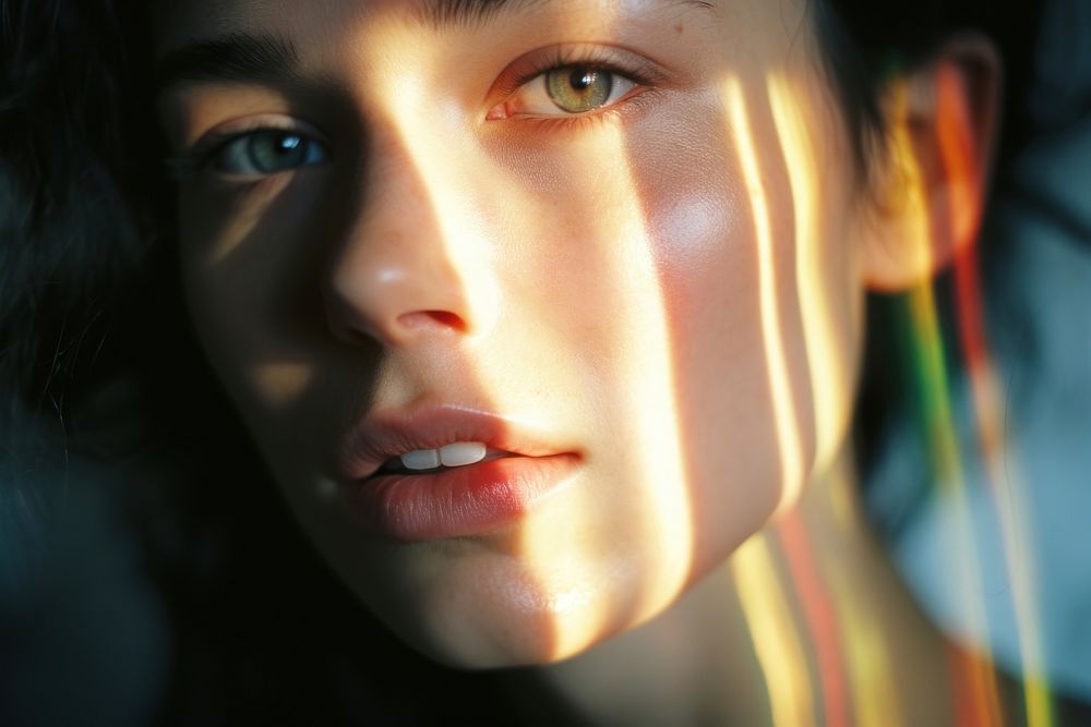 Rainbow light on women face photography portrait skin. AI generated Image by rawpixel.