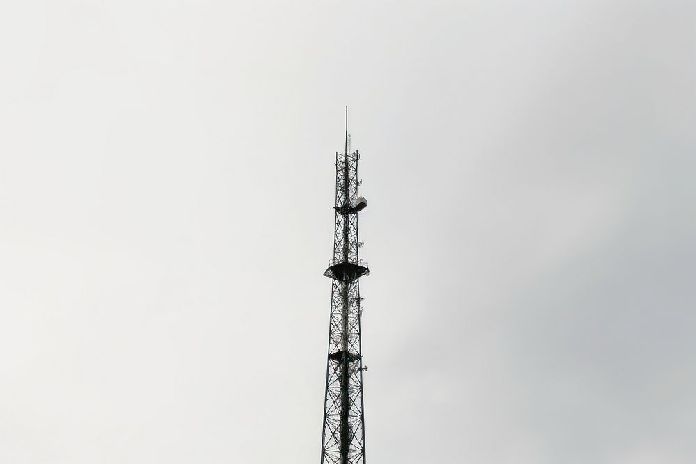 Mobile radio and telecommunication antenna tower architecture broadcasting electricity. AI generated Image by rawpixel.