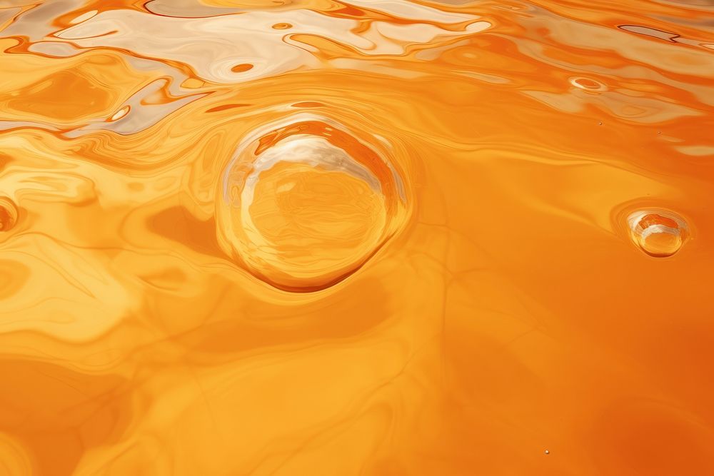 Oil drops outdoors wet orange color. AI generated Image by rawpixel.