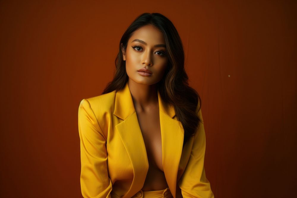 Filipino woman portrait yellow adult. AI generated Image by rawpixel.