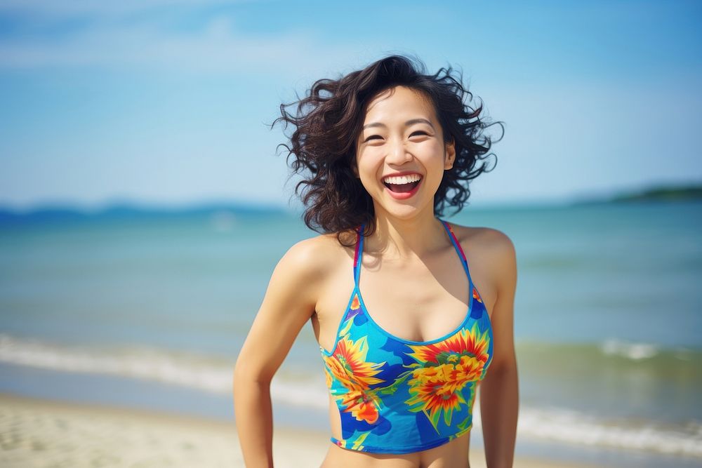 East Asian woman in the beach swimwear portrait laughing. AI generated Image by rawpixel.