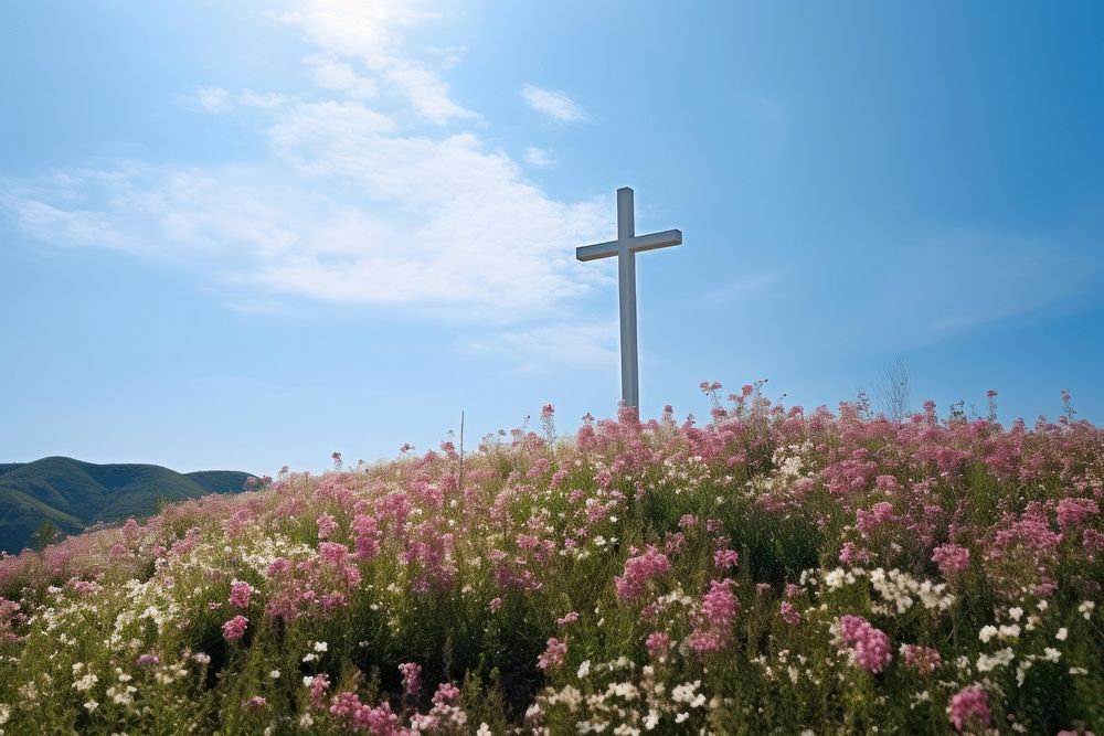 Cross on the flower hill sky outdoors cemetery. AI generated Image by rawpixel.