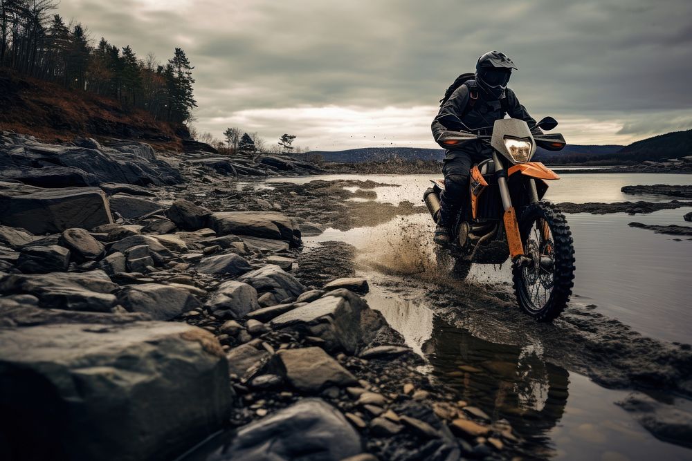 Man is riding his dirt bike motorcycle outdoors vehicle. AI generated Image by rawpixel.
