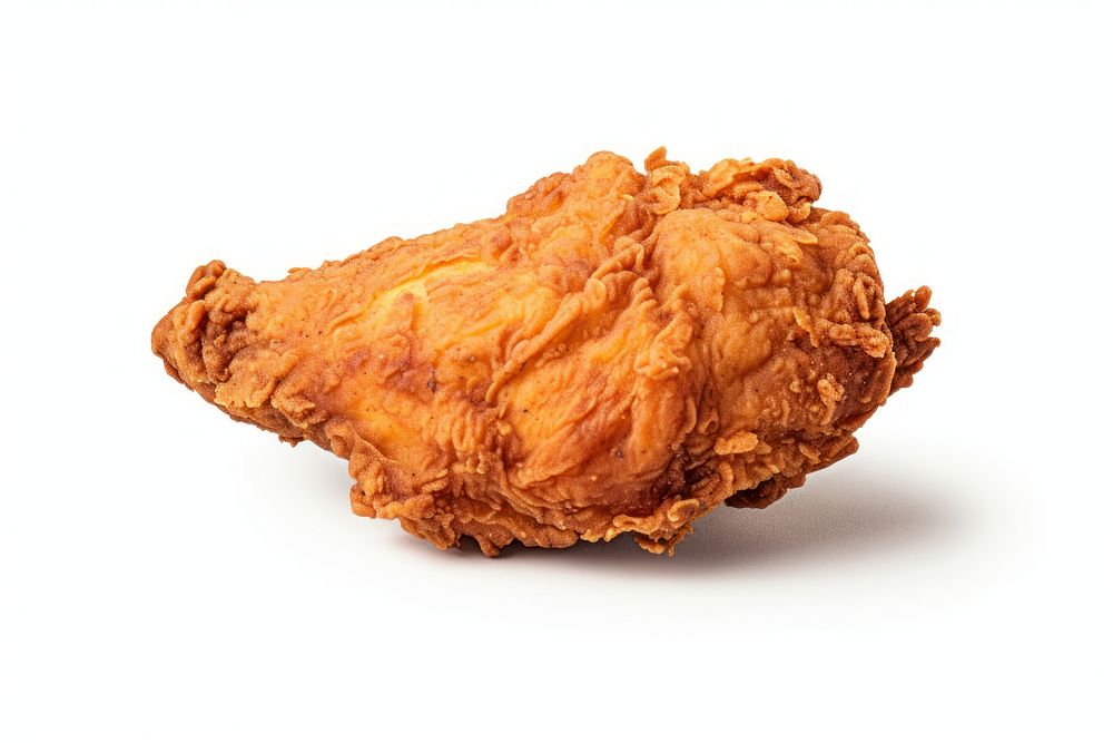 A fried chicken food white background freshness. AI generated Image by rawpixel.