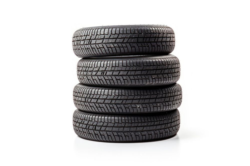 A stack of car tyres wheel tire white background. AI generated Image by rawpixel.