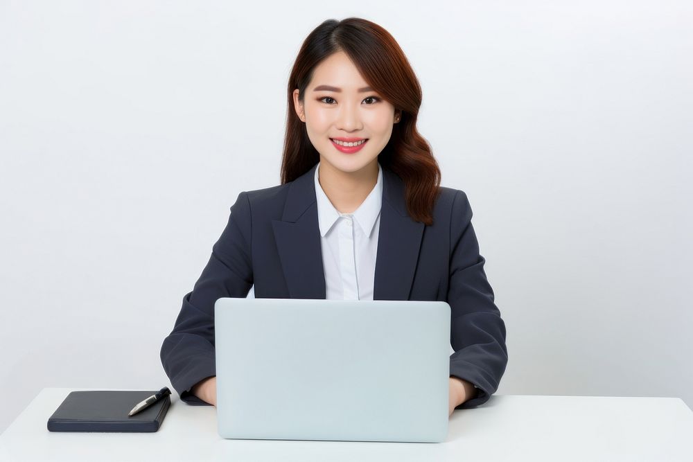 A Portrait of Beautiful Asian Manager Using Desktop Computer computer portrait working. AI generated Image by rawpixel.