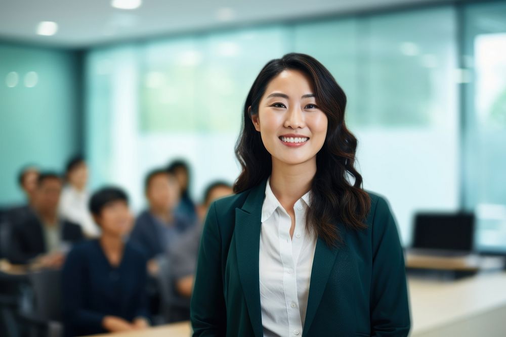 An asian woman presenting company profile on TV screen in the meeting room office adult smile. AI generated Image by…
