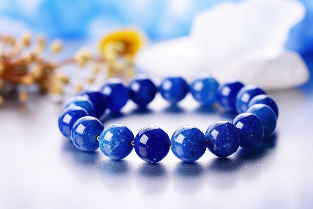 Lapis lazuli bracelet Spirituality stone necklace gemstone jewelry. AI generated Image by rawpixel.