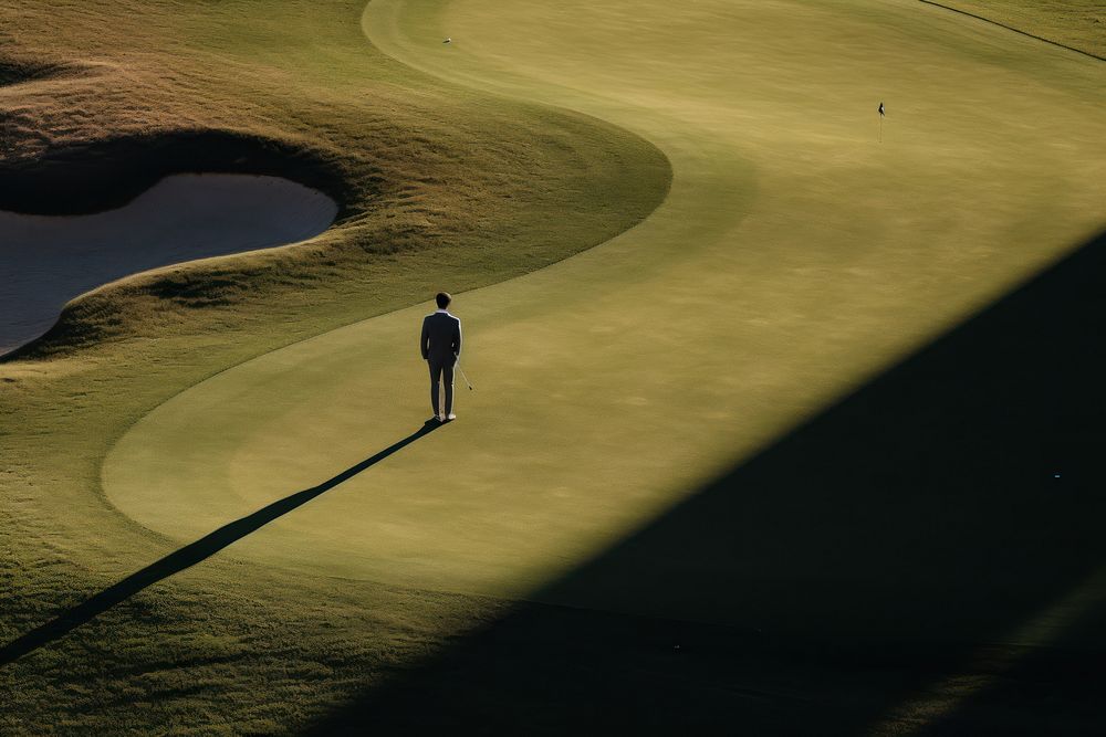 Man standing alone in golf course outdoors sports nature. AI generated Image by rawpixel.