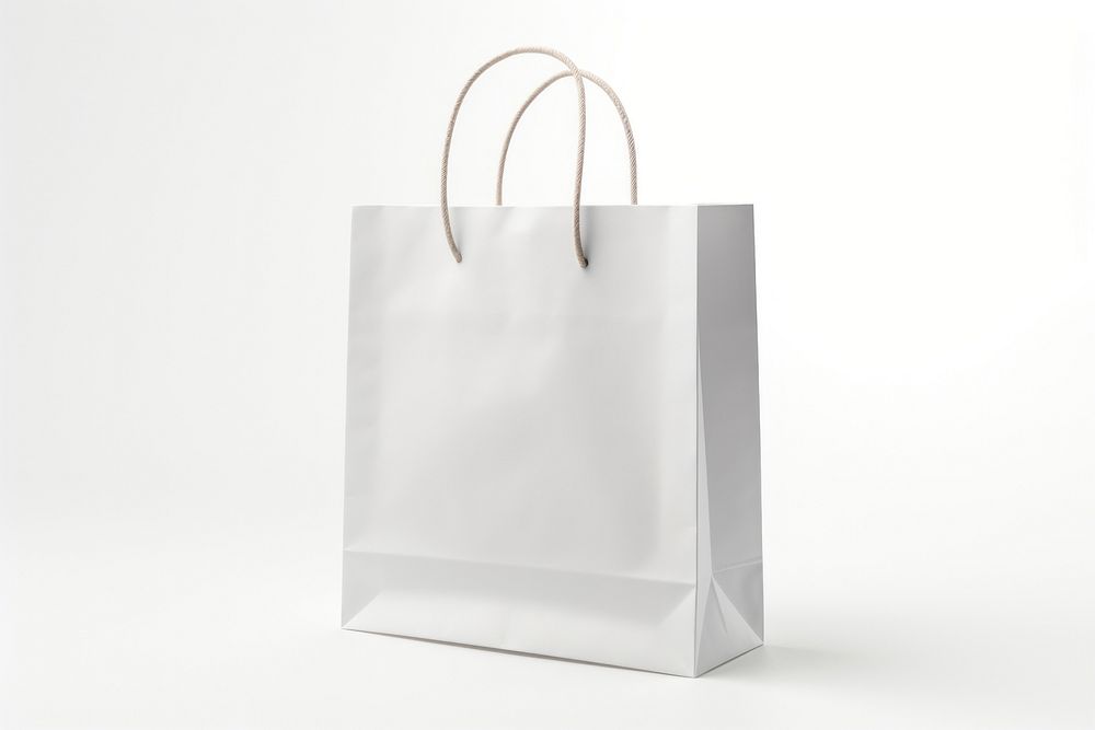 Plain white paper bag handbag white background celebration. AI generated Image by rawpixel.