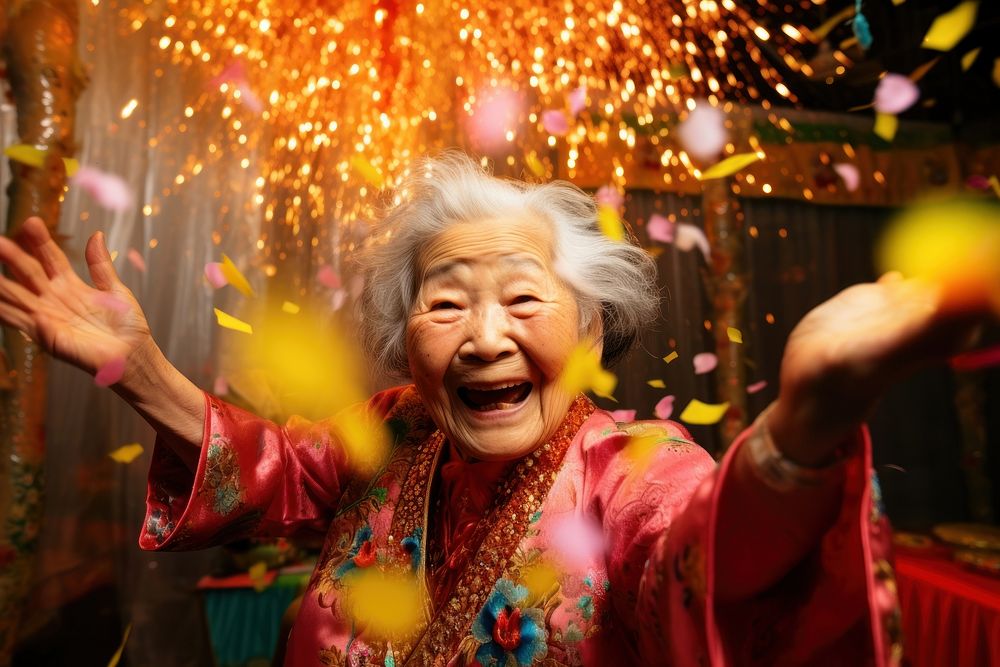 Senior Chinese woman celebrating party happy. AI generated Image by rawpixel.