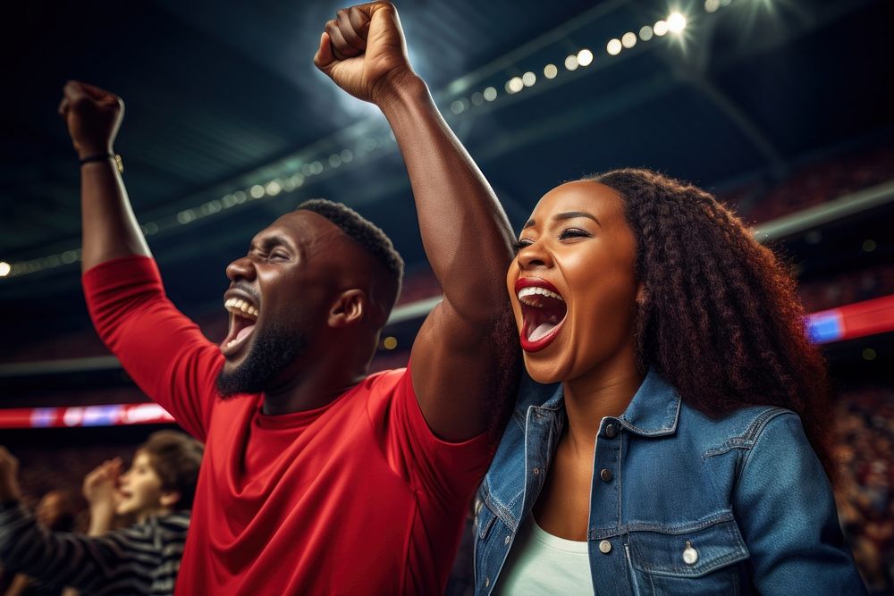 Black couple cheering sport game laughing stadium sports. AI generated Image by rawpixel.
