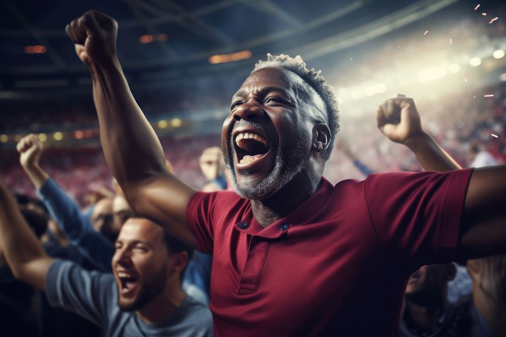 Black mature man cheering football game in stadium laughing sports adult. AI generated Image by rawpixel.