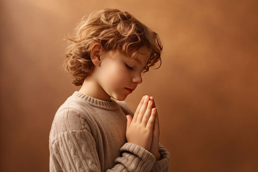 Kid praying hand contemplation. AI generated Image by rawpixel.