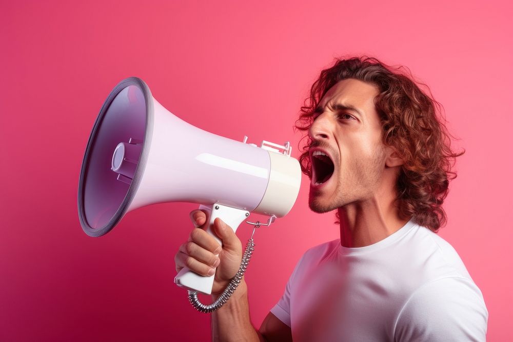 American man using megaphone shouting adult performance. AI generated Image by rawpixel.