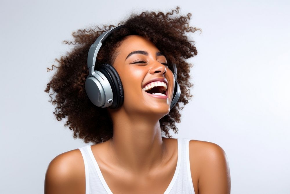 African american woman delight enjoy music headphones laughing headset. AI generated Image by rawpixel.