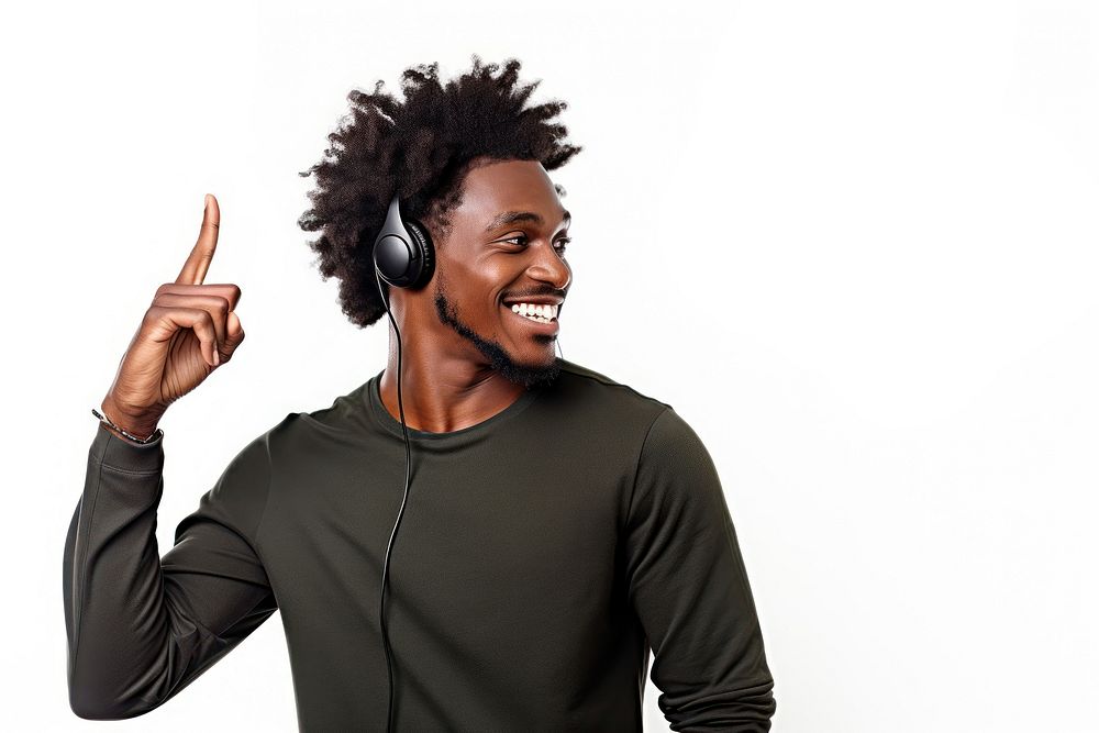 African american man enjoy music while finger pointing to his ear laughing smile adult. AI generated Image by rawpixel.