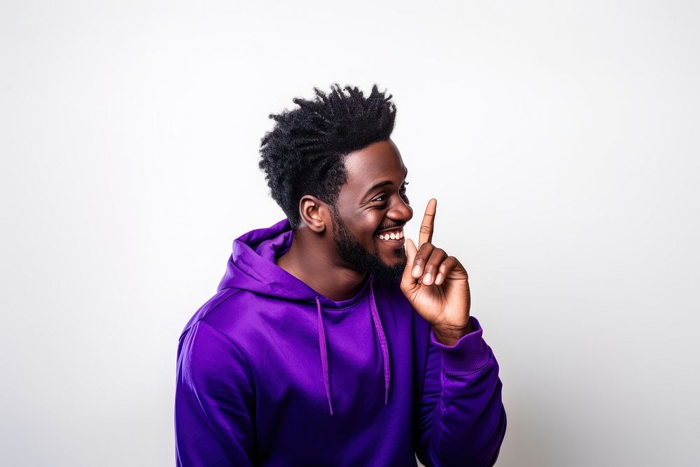 African american man enjoy music while finger pointing to his ear portrait purple adult. AI generated Image by rawpixel.