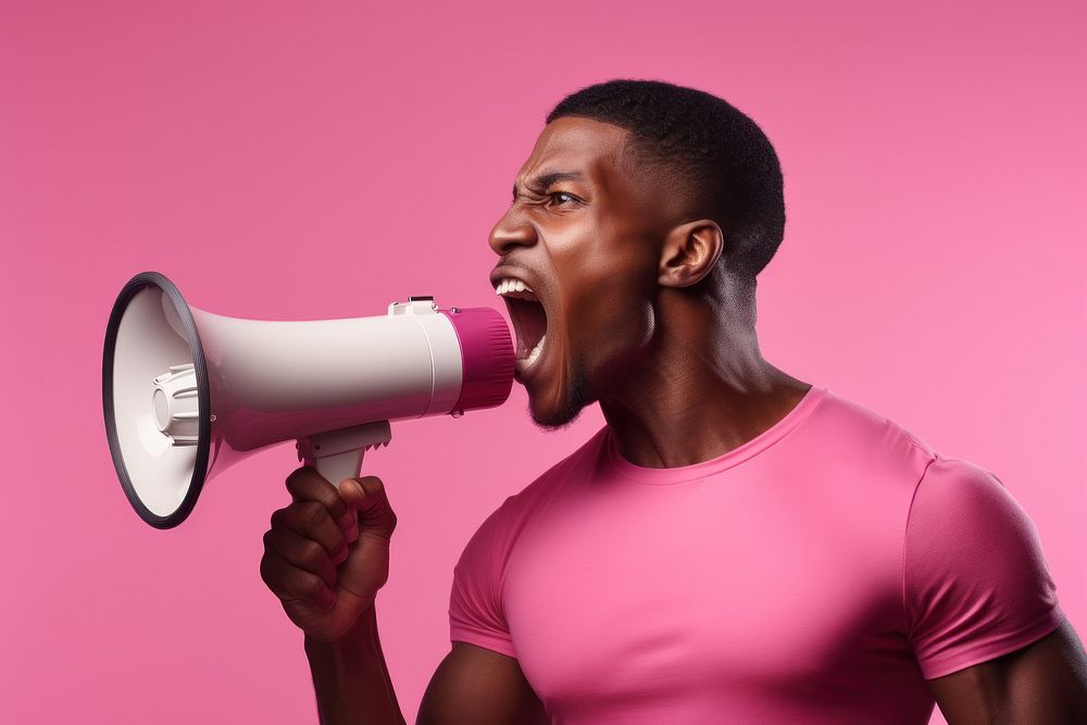 African american man using megaphone shouting adult technology. AI generated Image by rawpixel.