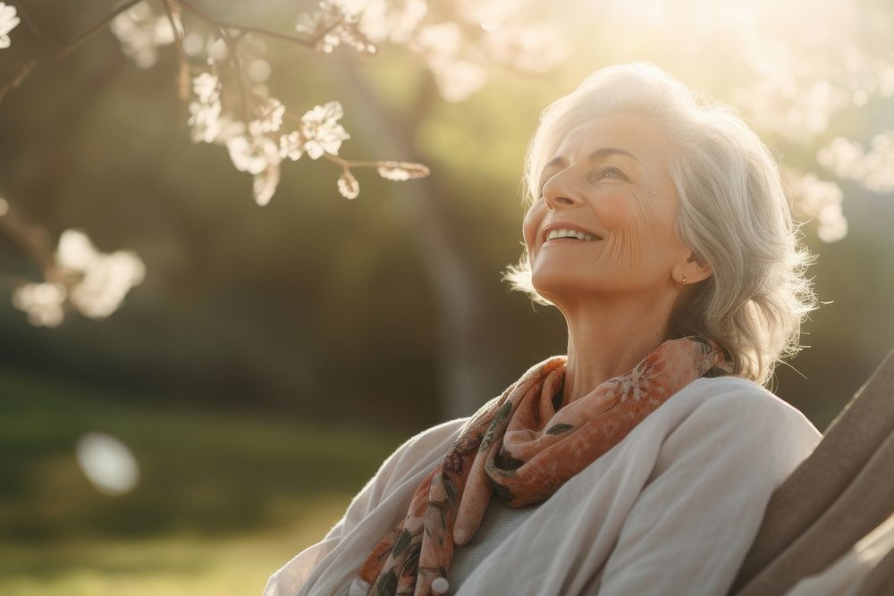 Happy senior woman relaxing outdoors adult sun. AI generated Image by rawpixel.