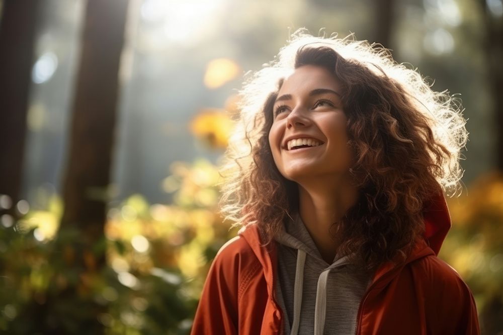 Happy woman enjoying nature woods forest laughing smile adult. AI generated Image by rawpixel.