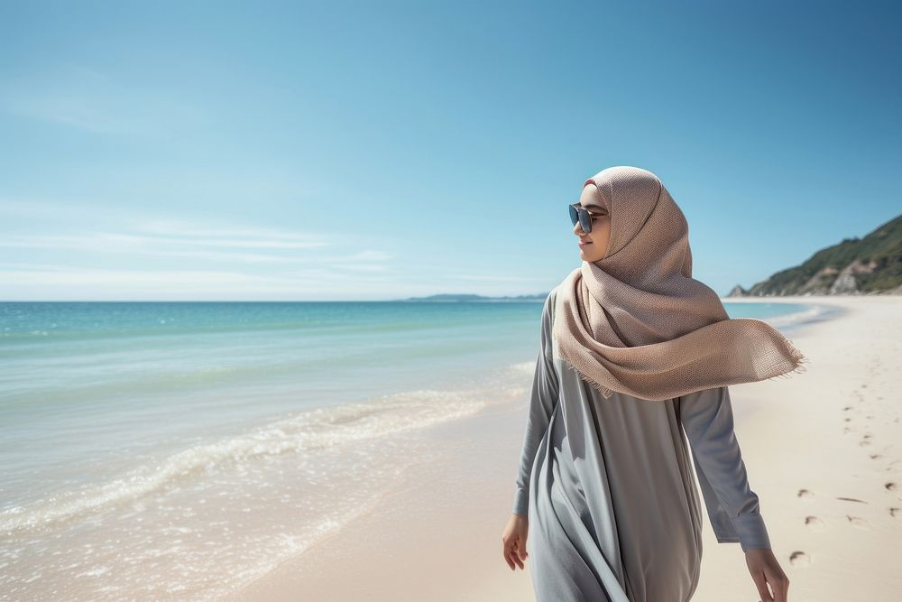 Hijab tourist outdoors walking beach. AI generated Image by rawpixel.