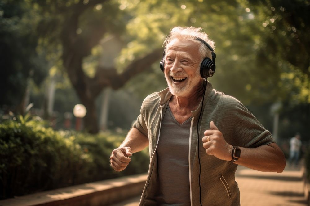 Old man happy running headphones sports adult. AI generated Image by rawpixel.